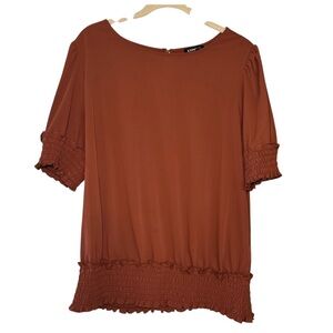 Express rust colored blouse Size L
